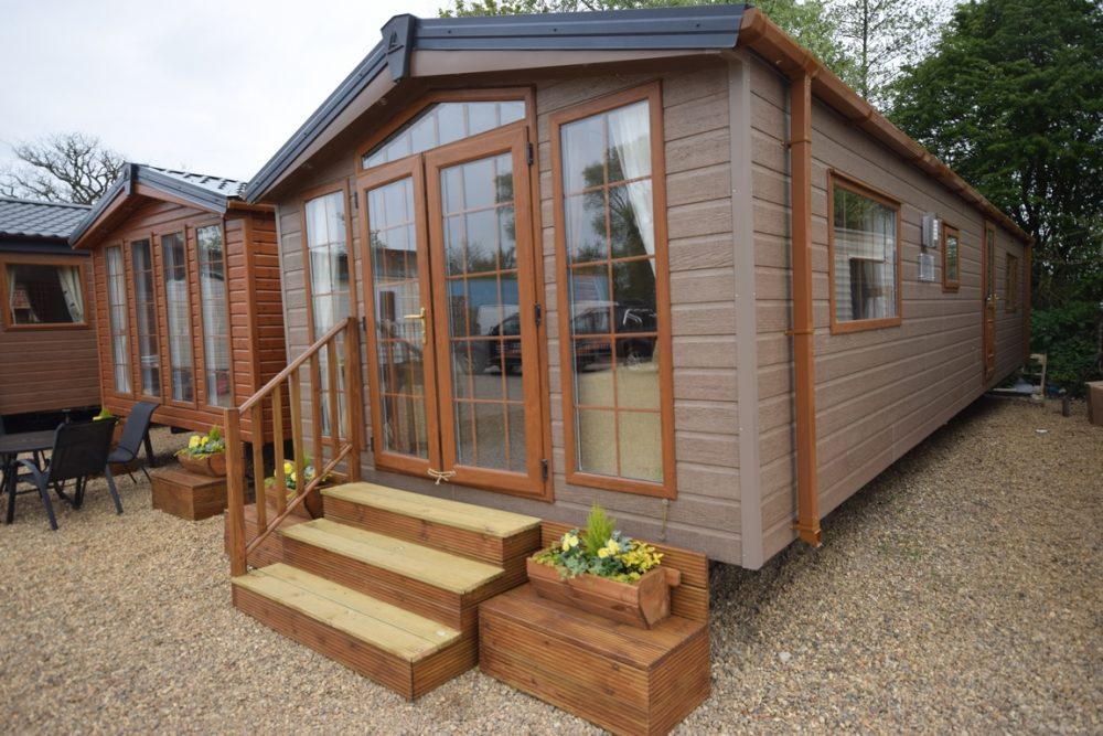 Available Oct 2022 Sunrise Lodge Deluxe 38×13 2 beds Barnwood CanExel